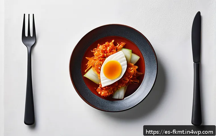 발효식품의 예술적 표현과 현대 디자인 - A minimalist gourmet plating of traditional Korean kimchi presented as an abstract art piece on a ma...